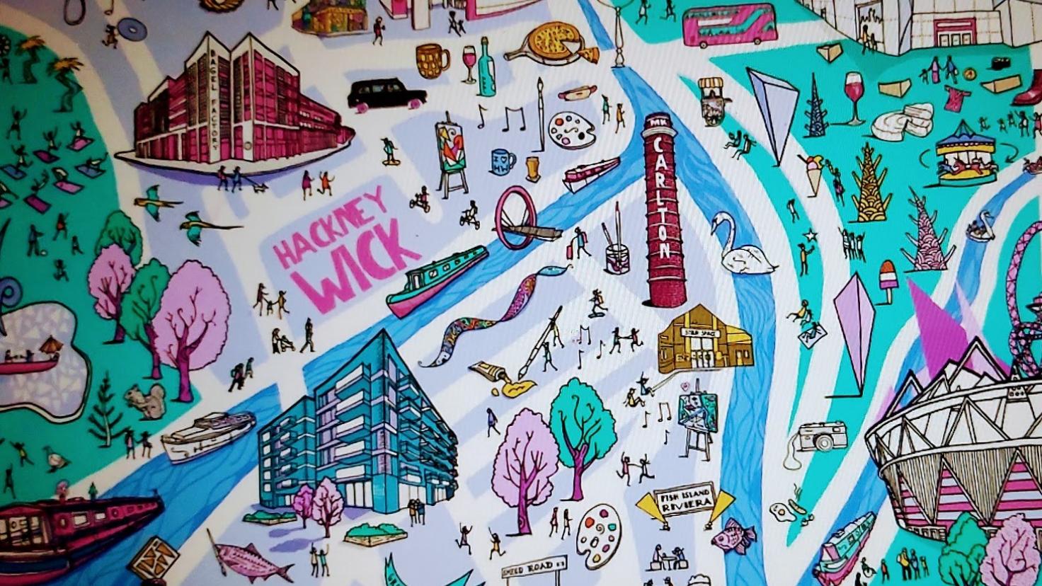 A colourful map mural showing buildings, rivers and green spaces and the words 'Hackney Wick'.