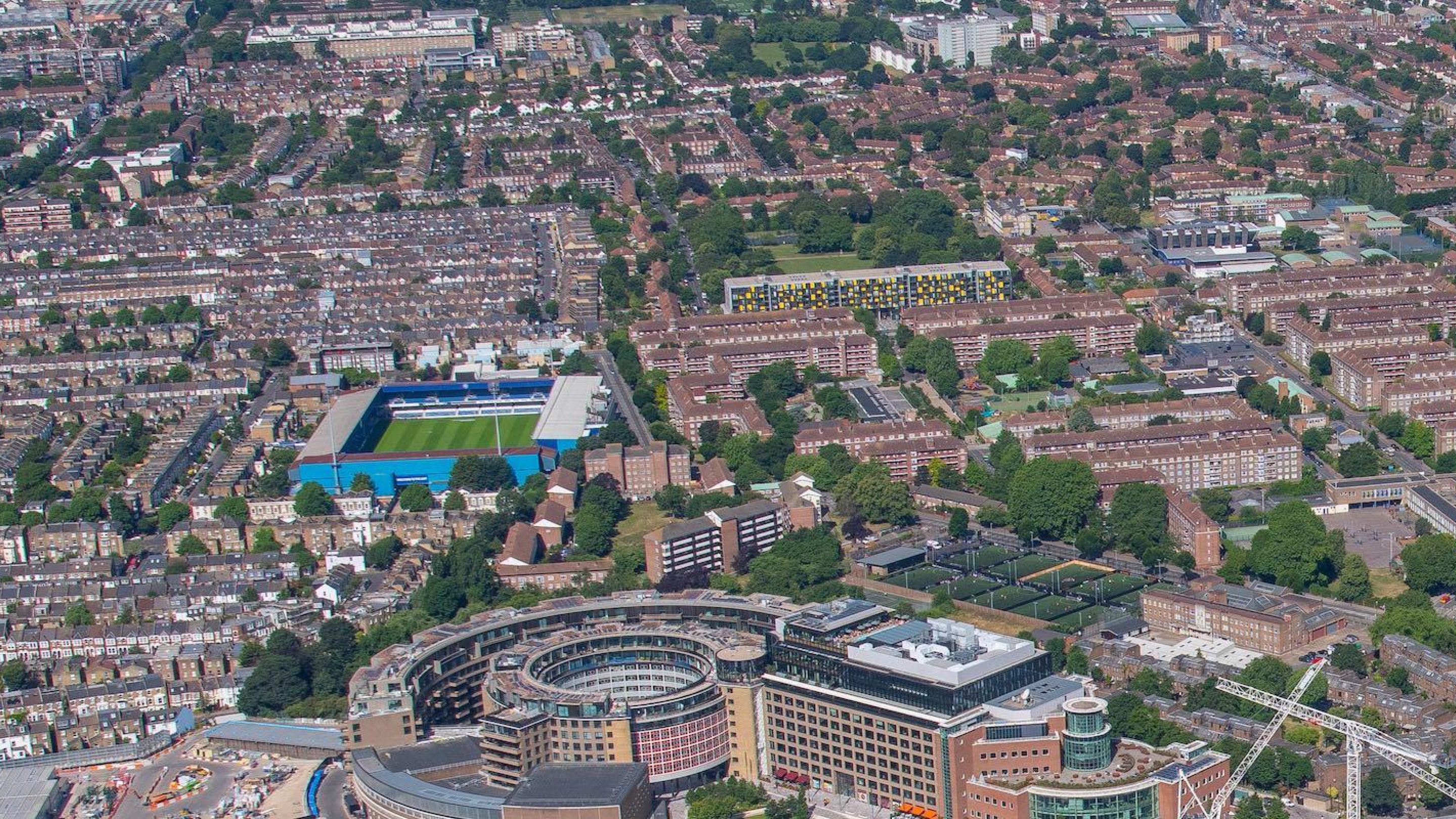 An aerial photograph of housing over a wide area.