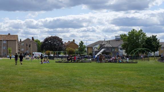 Tantony Green park - a children's playpark set in a green field in front of housing.