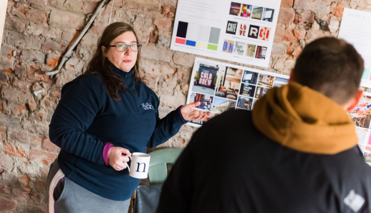 A partnership member takes a resident through the moodboard for the new Selby Big Local community hub.