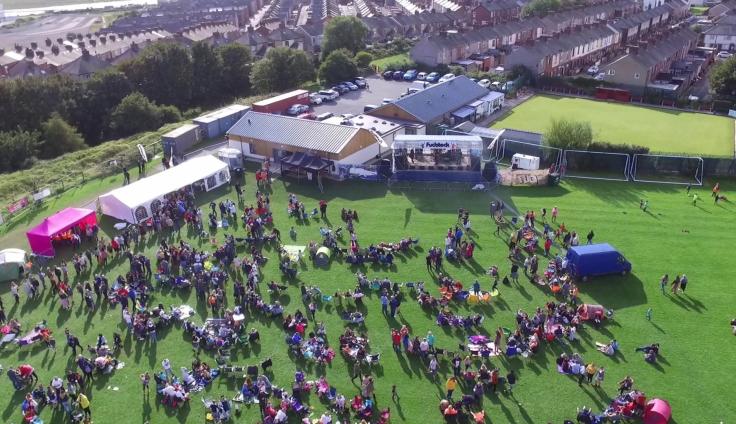 Aerial view of an event held at Cavendish Park, Barrow Island with a stage and marquee