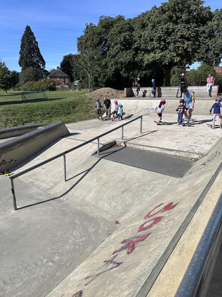 Concrete slopes in a skate park on a sunny day.